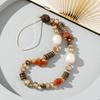 New Bohemian holiday style natural gravel mobile phone chain personalized niche crystal pearl mobile phone lanyard