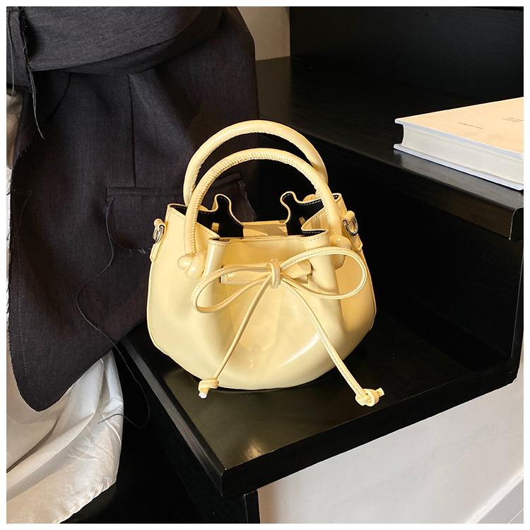 

Сумка премиум-текстуры маленькая женская 2025 новая модная универсальная сумка-мессенджер летняя портативная сумка-ведро маленькая сумка жёлтый