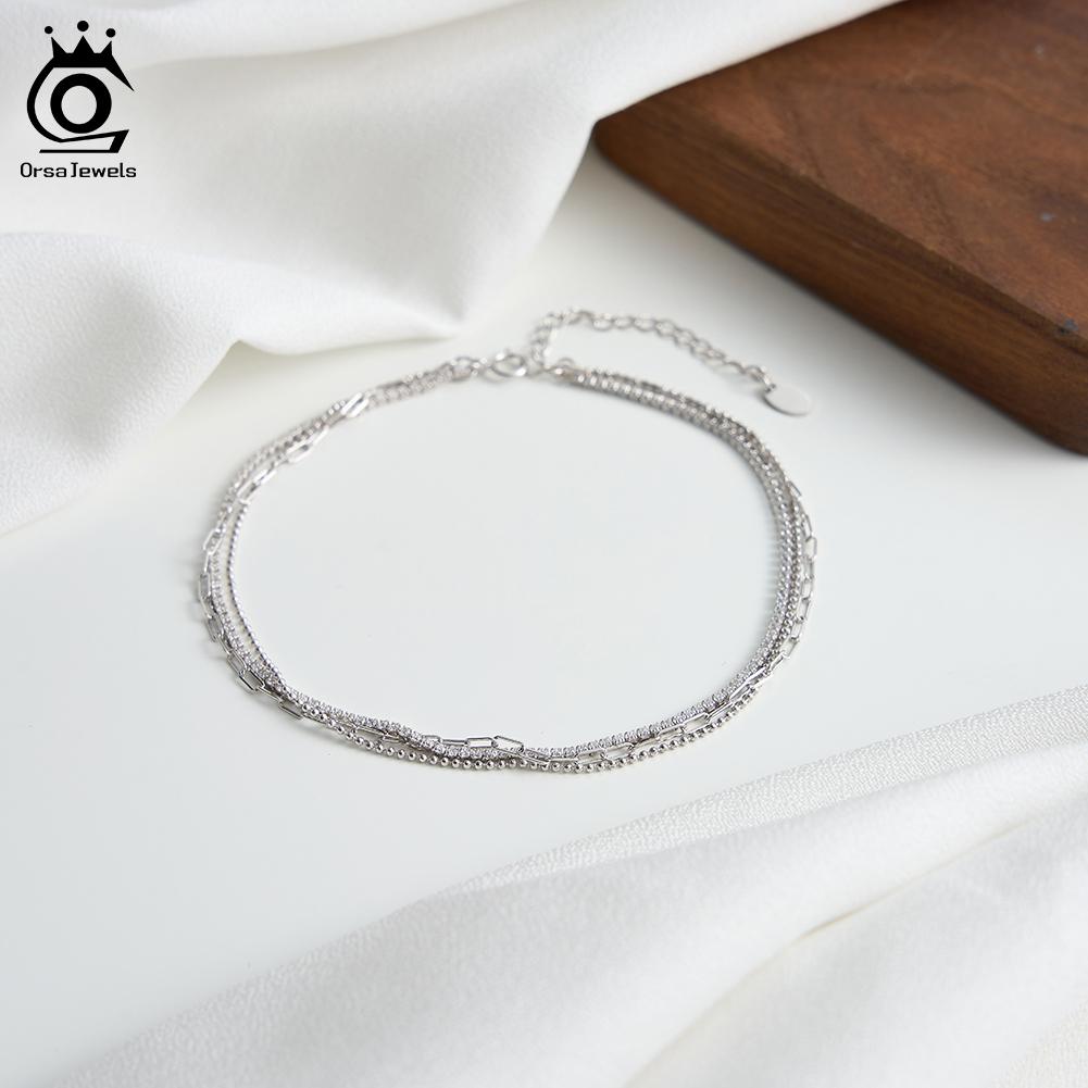 ORSA JEWELS Elegant Layered 925 Sterling Silver Chain Anklet for Women Summer Sexy Beach Foot Chain Ankle Straps Jewelry SA104