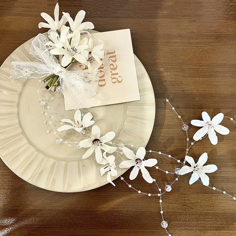 

Travel photo simulation lily of the valley flower hairpin female Mori atmosphere super fairy tassel side clip