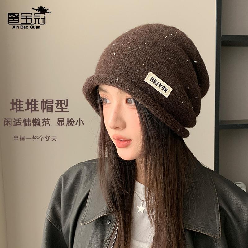 Curled head hat women's autumn and winter outdoor warm ear protection knitted wool hat showing face small versatile pile hat