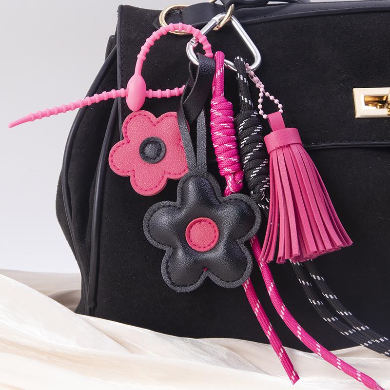 

Yogodlns Exquisite Cute Faux Leather Flower Tassel Braided Rope Bag Charms Pendant For Handbag Purse Backpack Accessories one size розовый/чёрный