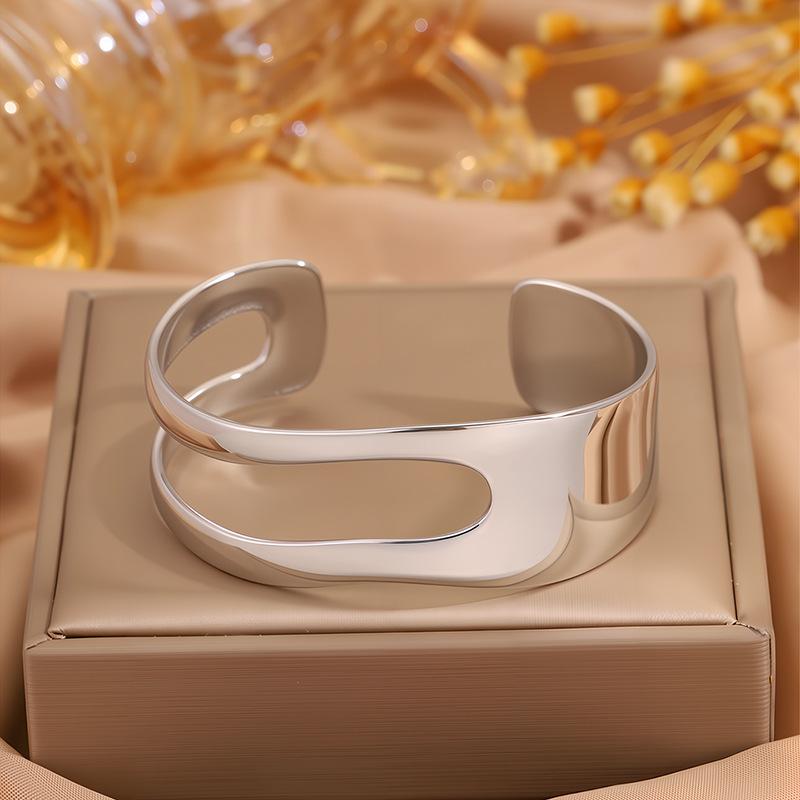 Stainless steel  women's opening C-shaped hollow irregular K gold-plated glossy  exaggerated and simple design arm ring