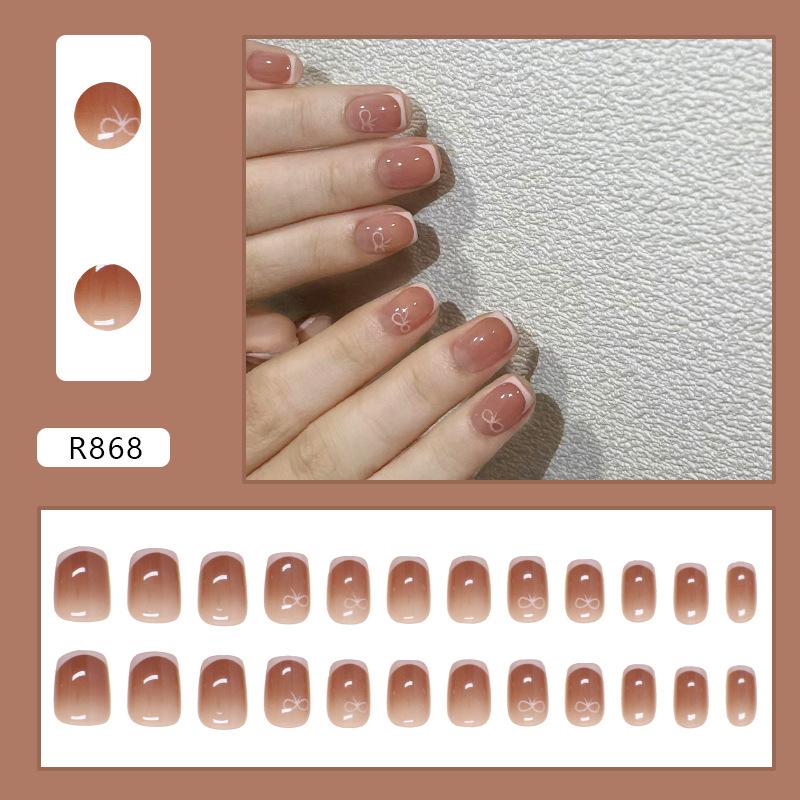 

Wearing nail piece Solid color French removable nail piece Bow nail piece Simple fake nail piece 24 pieces