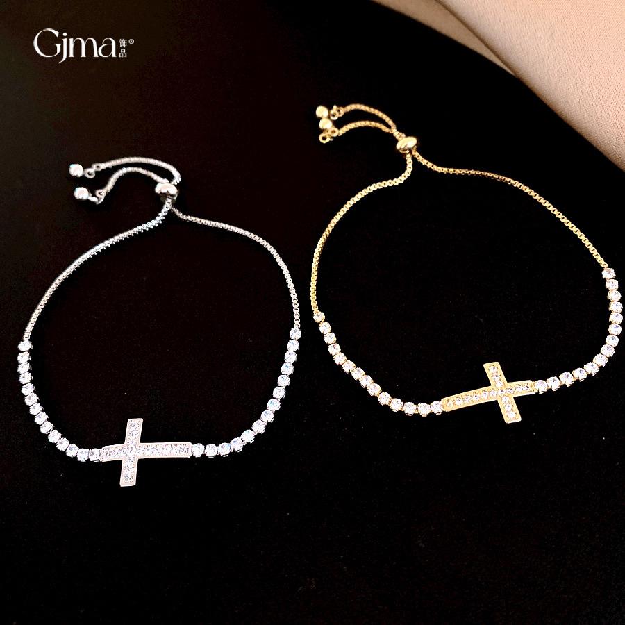 Französische einfache Zirkon-Kreuz-Auszieharmband leichte Luxus-Ohrringe exquisite personalisierte Schmuckstücke Damen