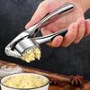 Garlic press, stainless steel garlic press, professional garlic press, dishwasher safe, garlic press with non-slip handle