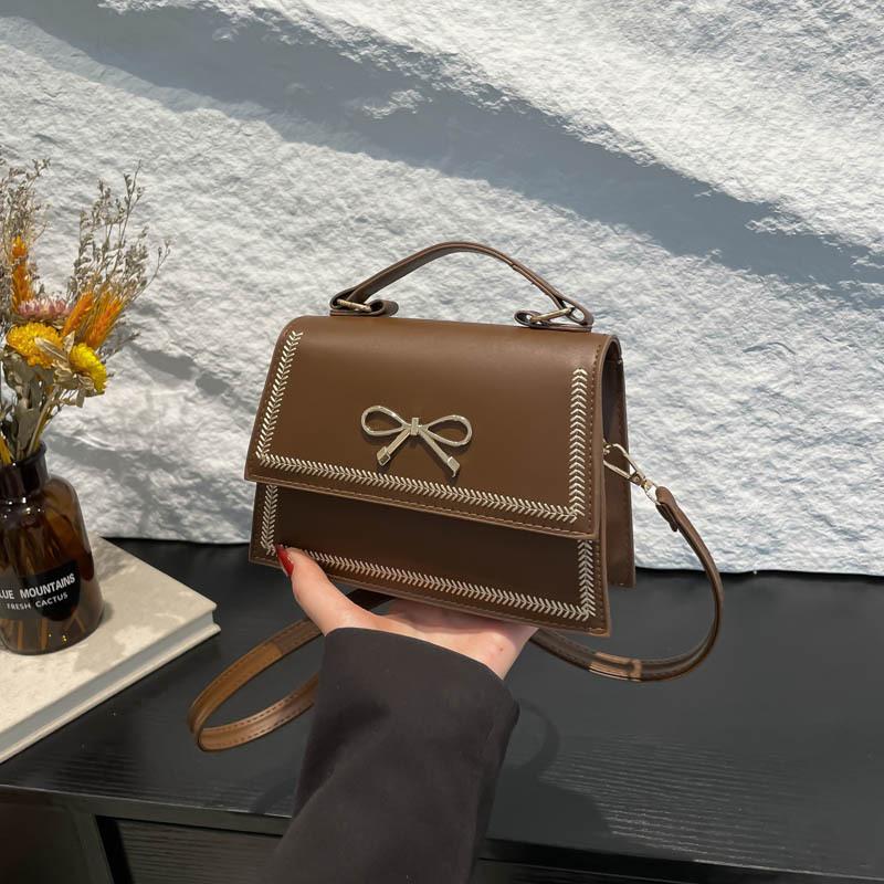 2025 summer new fashion large capacity simple casual texture solid color large capacity bow shoulder messenger bag