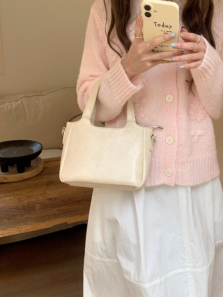 Summer fresh and simple bucket bag for women 2025 new solid color commuting shoulder bag, hand-held vegetable basket crossbody b