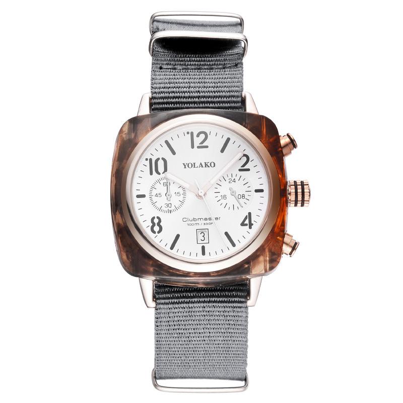 

Популярна зірка ж календар мода два ока цифровий жіночий годинник жіночий годинник полотняний ремінь сірий колір