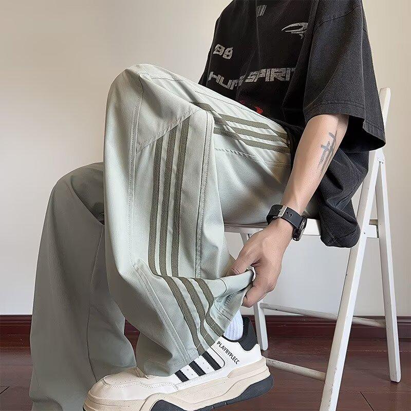 

Унисекс ретро полосатые быстросохнущие широкие брюки-десантники M серый