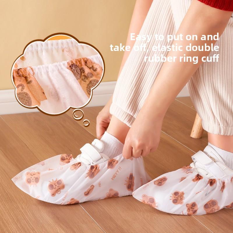 

50Pcs/set Disposable shoe cover Household indoor non-slip non-woven fabric Thickened cartoon printing Repeated use Wear-resistant adult foot cover 50pcs
