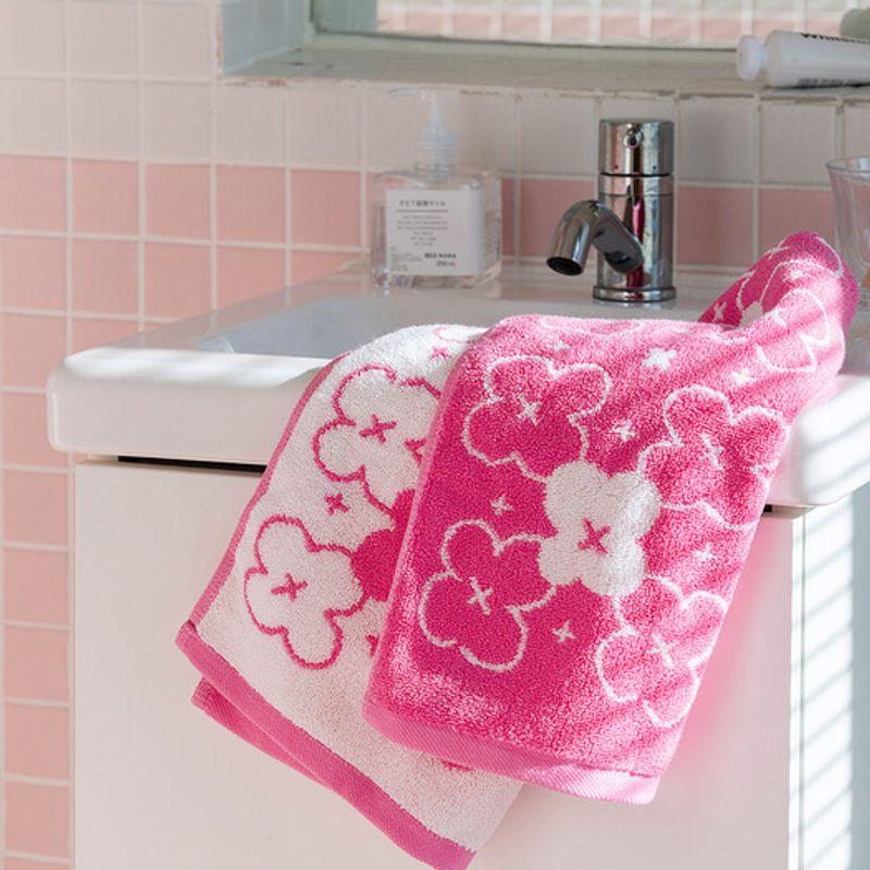 Romane handduk med Brunch Brother-mönster