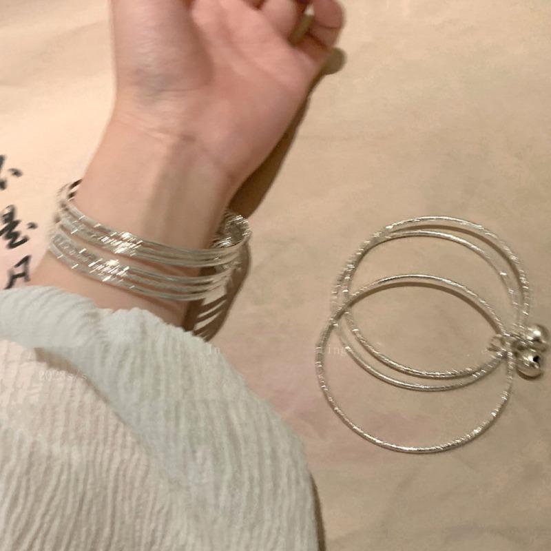 Multi-ring Bell Pendant Bracelet - Simple, Cool, Trendy, Unique, Versatile, Elegant and High-end Accessory.
