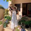 Fairy White Dress Seaside Vacation Beach Skirt Feeling French Long Skirt Suspender Long Skirt Summer Loose Europe and America