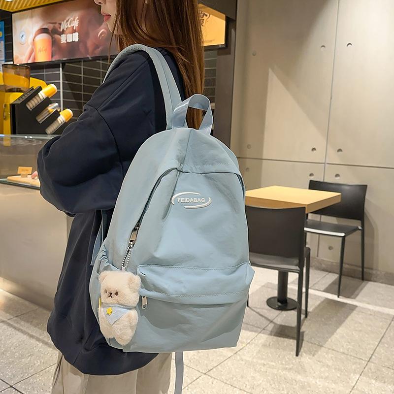 College style schoolbag for girls Junior high school students Simple large-capacity computer backpack Casual high school students Travel backpack tide