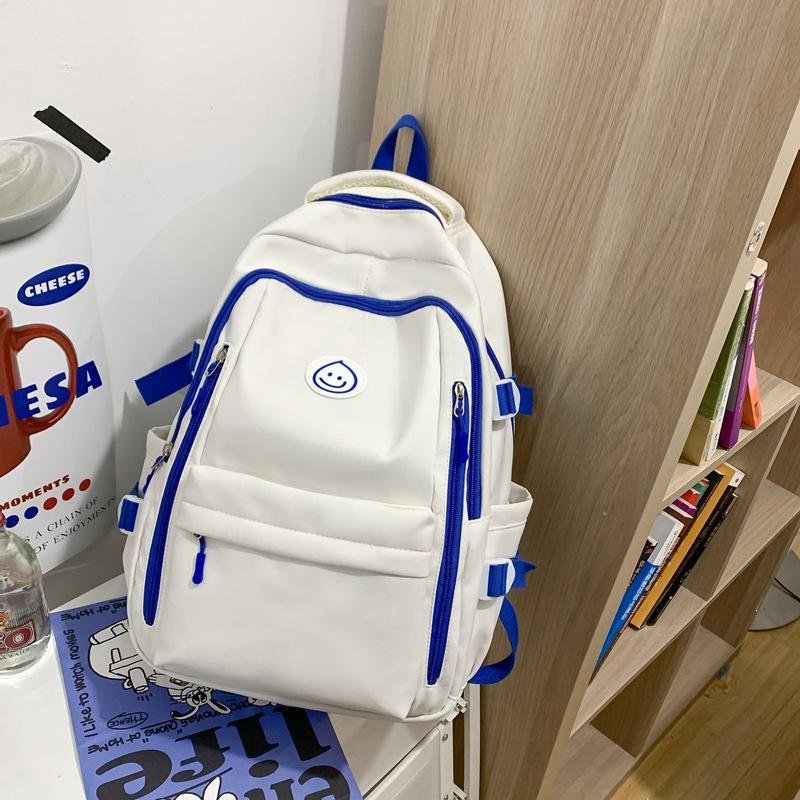 Schoolbag student schoolbag smiley face printing contrasting color large-capacity backpack Korean version Chinese college students commuting 
