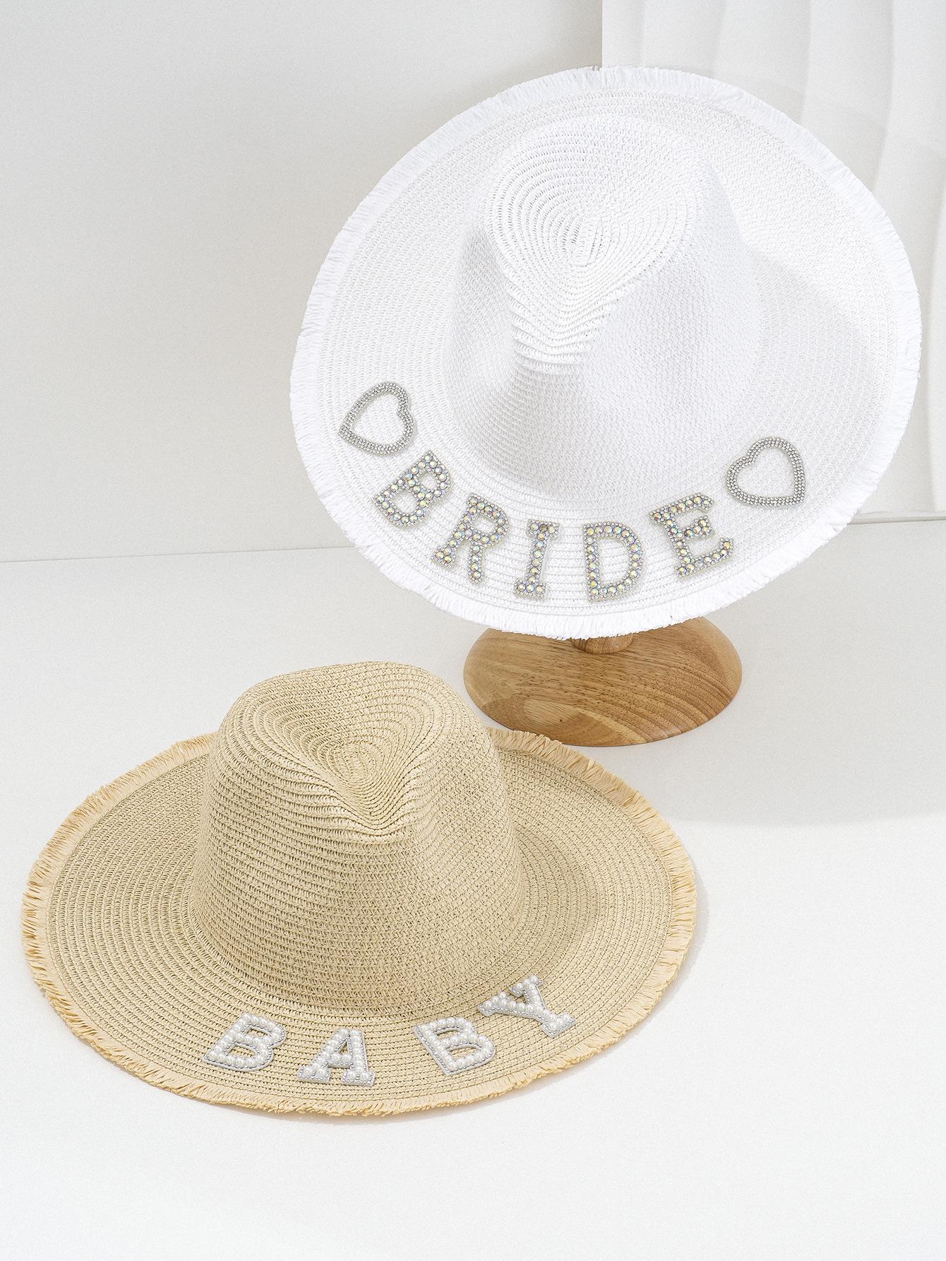

Унисекс Панама из соломы с надписью из страз BRIDE и жемчужным сердцем - Пляжные аксессуары Medium (56-58 cm)