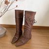 In the autumn of 2025, the new retro small man with pointed head straps and Korean version of thin inner rubbing high short boots women