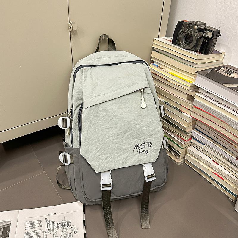 New Schoolbags  Large Capacity  Light Girls  Cute Multifunctional Anti Splashing Couple Backpacks.