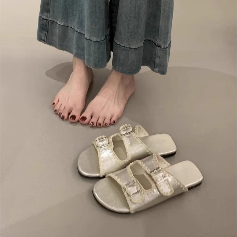Retro niche beach flat-bottomed open-toed cool slippers for women's summer wear French casual black one-word slippers
