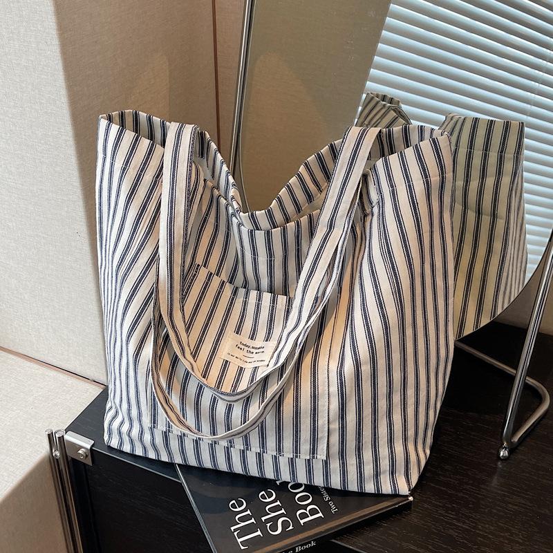 Foreign style texture niche large-capacity bag women's fashion 2025 summer new foreign style canvas shoulder tote bag