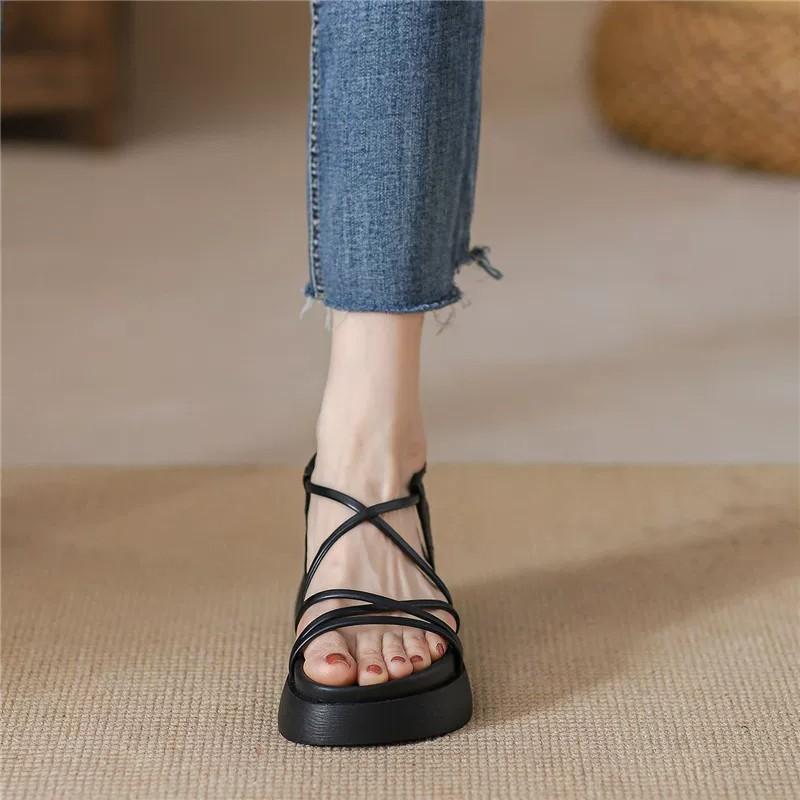 Roman sandals women's 2026 new summer thick-soled one-word belt versatile fashion flat-bottomed fairy style muffin women's shoes