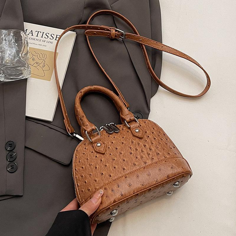 

Новый нишевый дизайн, модная портативная сумка-ракушка, женская универсальная сумка-мессенджер в стиле Spice Girl для повседневной носки с текстурой