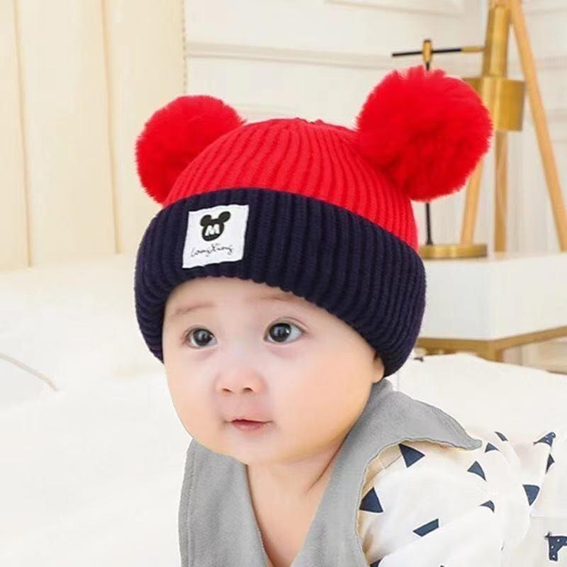 Baby autumn and winter cute cartoon warm hairball wool hat boys and girls baby ear protection hat children pullover knitted hat