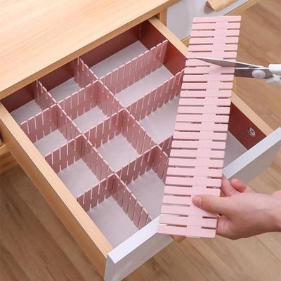 Séparateur de tiroir réglable pour l'organisation de la cuisine ou de la garde-robe