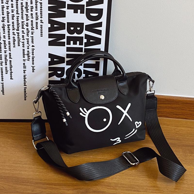 Large capacity bag women's new high-end sense niche portable shoulder bag fashion messenger tote bag tide