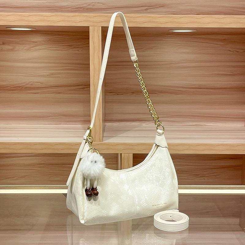 Knödelförmige Umhängetasche mit einem Unterarmgurt, Eine hochwertige und Nischen-Damen-Crossbody-Tasche