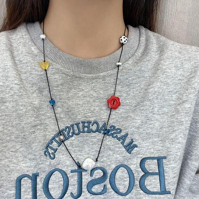 Versatile Childlike Dopamine Clavicle Necklace: Unique, Simple, Niche Design with Sweater Chain Accessories