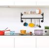 Industrial Style Wall-Mounted Clothing Display Rack with Water Pipe Design