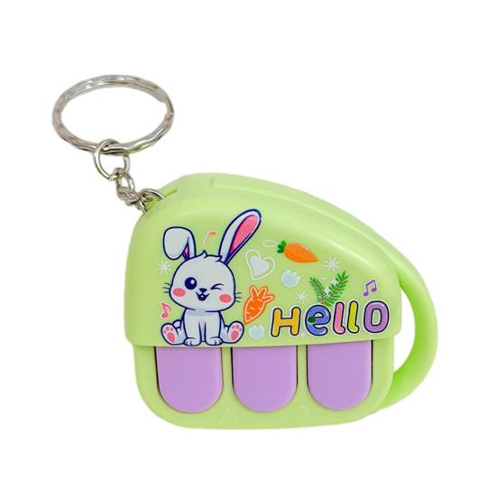 

Mini Cartoon Piano Keychain with Voice Recorder Creative Music Box Toy Pendant for Bags Backpacks Novelty Gift for Kids Teens Fun Party Favor Grab зелений