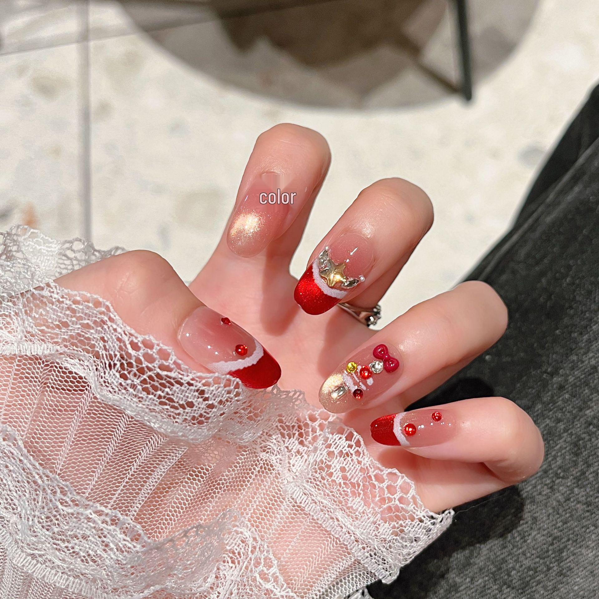 

Christmas Red French Short Oval Nails with Bow & Snowflake Design