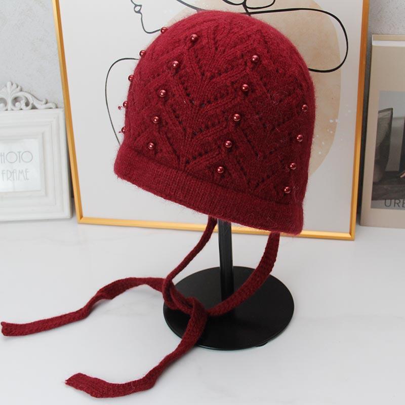 Pearl lace-up ear protector wool hat women's autumn and winter soft waxy rabbit hair knitted hat pearl twist bag head thermal hat