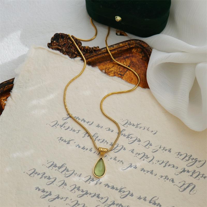 French Transparent Green Water Drop Ocean Necklace with Snake Bone Chain - Fashionable Gold-Plated Titanium Steel.