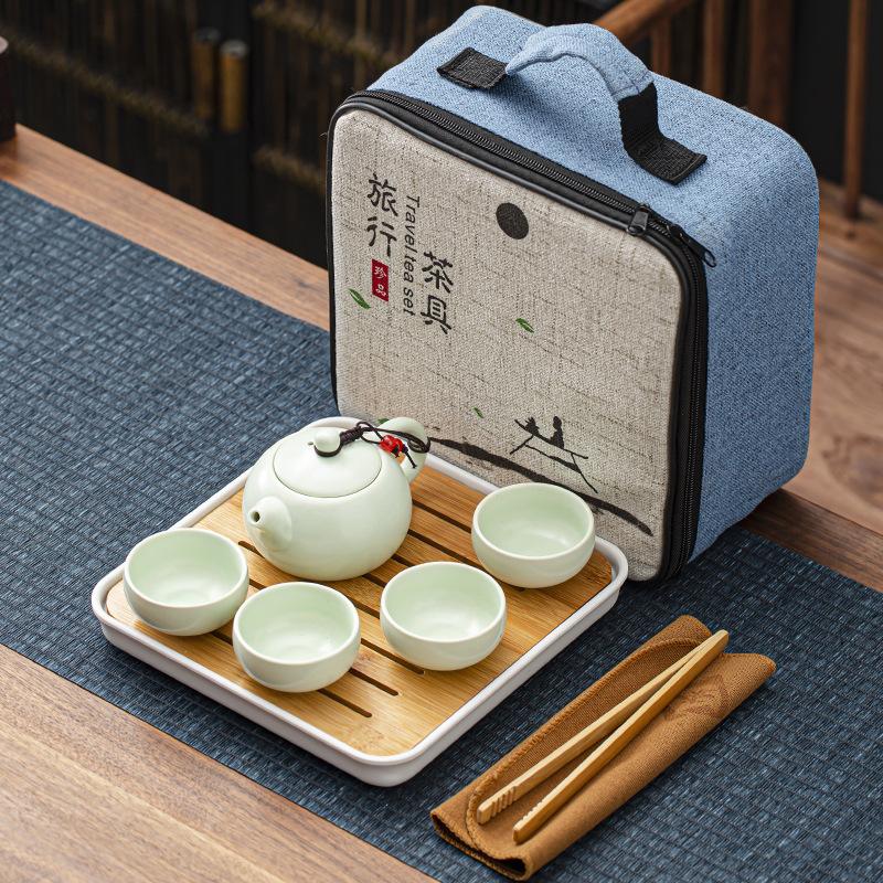 Travel bag, ceramic kung fu tea set, one pot, four cups, melamine tea tray, a complete set of portable business gifts, meeting