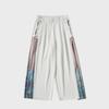 Men's Summer Ice Silk Hanfu Pants: Ancient Style Nine-Point with Chinese Print and Pendant Details.