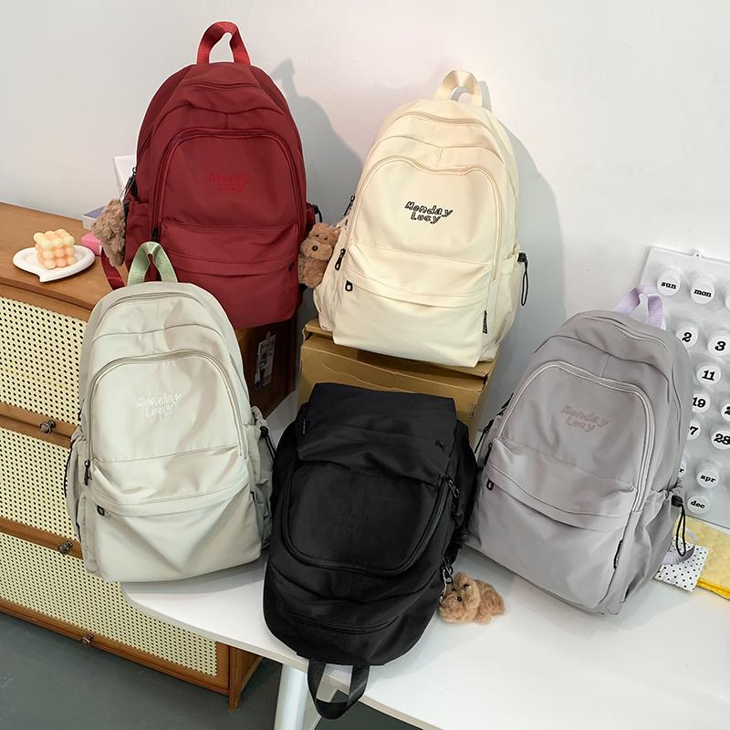 Jednobarevný školní batoh pro studenty nižší střední školy s velkou kapacitou, dámský batoh s výšivkou písmen