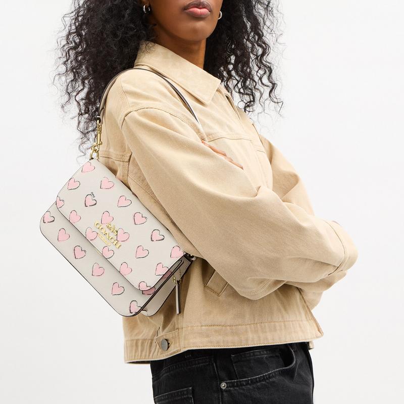 Coach [Qixi Festival Limited] Brynn 23 Love Print Metal Logo Cowhide Armpit Bag Crossbody Shoulder Bag Medium Women’s Chalk White
