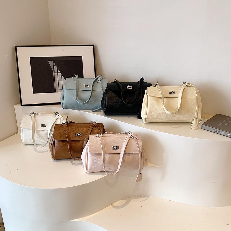 Autumn new style fashion lock locomotive bag portable shoulder oblique span women's bag