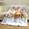 A cute fawn surrounded by delicate flowers and soft pastel foliage. for all seasons blanket lunch break throw gift