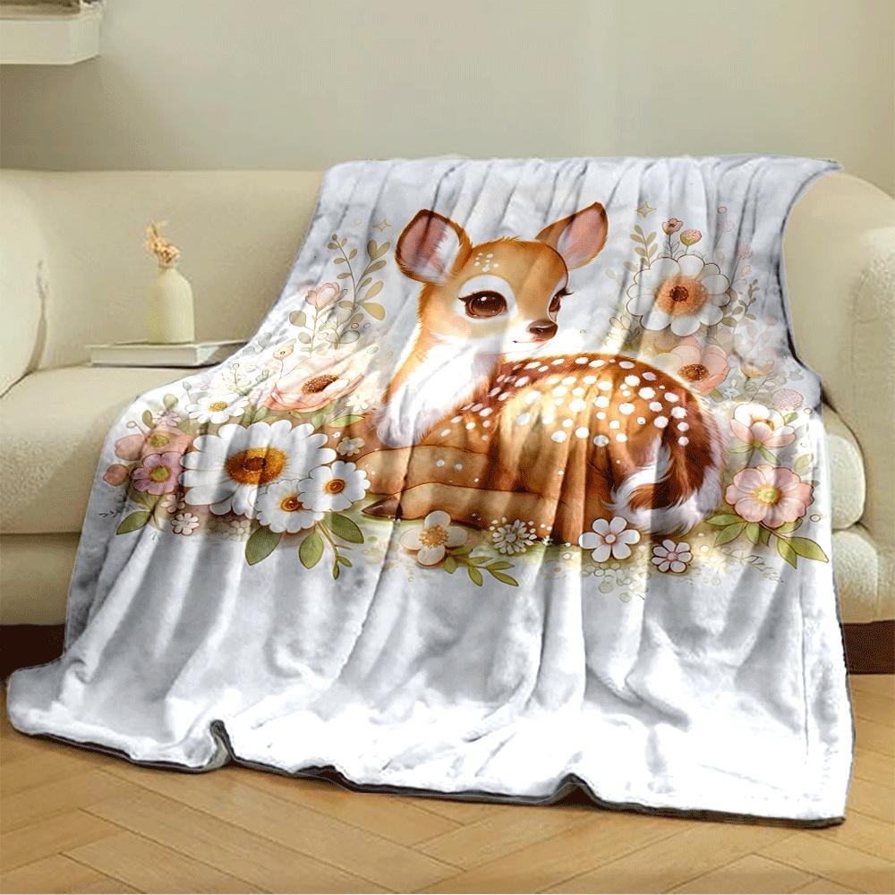 A cute fawn surrounded by delicate flowers and soft pastel foliage. for all seasons blanket lunch break throw gift