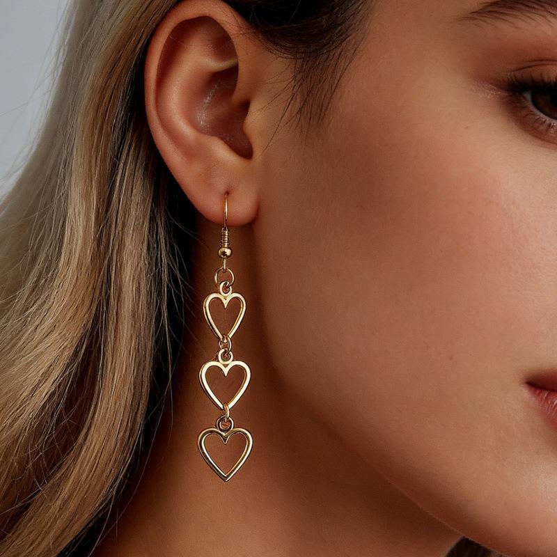 European & American Style Hollow Heart Long Earrings - Elegant, Versatile, Celebrity-Inspired.