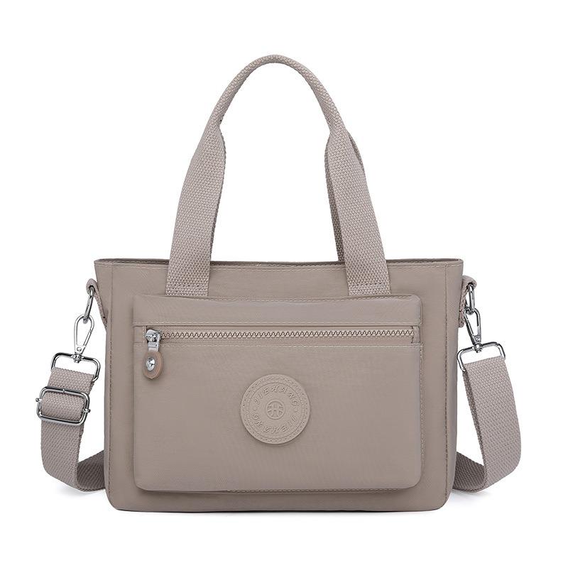 Nova moda de verão simples bolsa de ombro portátil de grande capacidade bolsa de pano bolsa mensageira casual leve