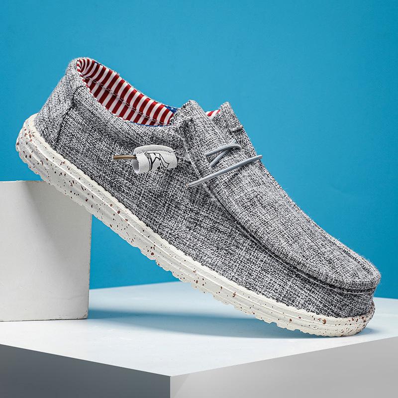 

Чоловічі великі розміри легкі повсякденні парусинові лофери в корейському стилі темно-сірий