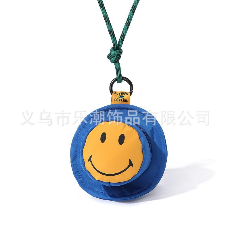 

New earphone bag printed mini bag pendant portable storage bag coin key bag printed O change makeup синій