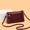 Elegant Crossbody Bag with Textured Finish and Dual Zip Pockets