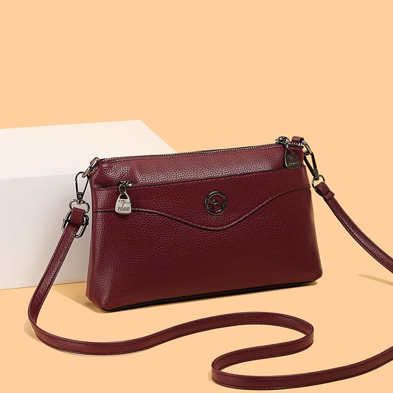 Elegant Crossbody Bag with Textured Finish and Dual Zip Pockets